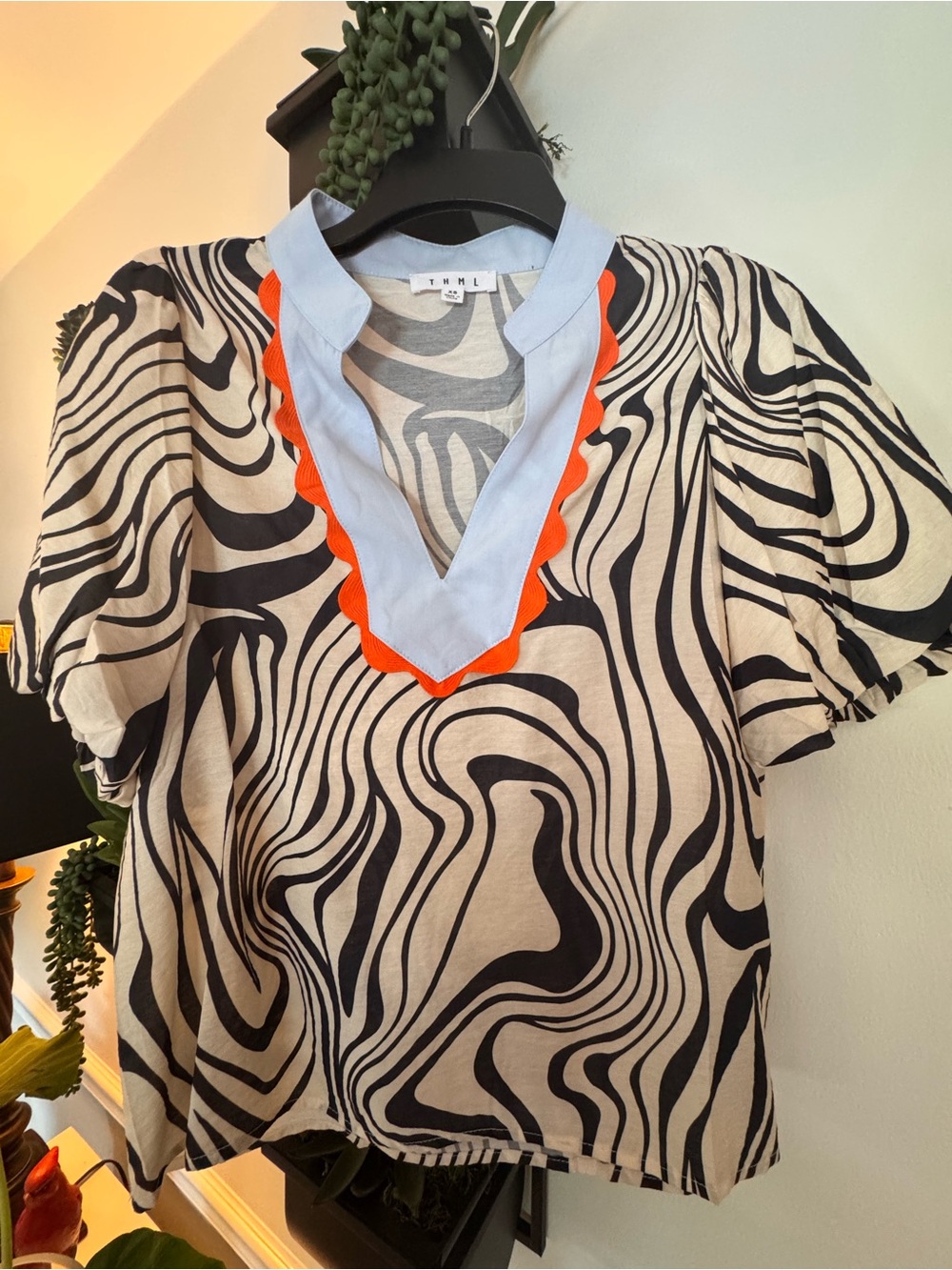 THML Light Blue & Black Swirl V-Neck Women’s Top with Orange Trim